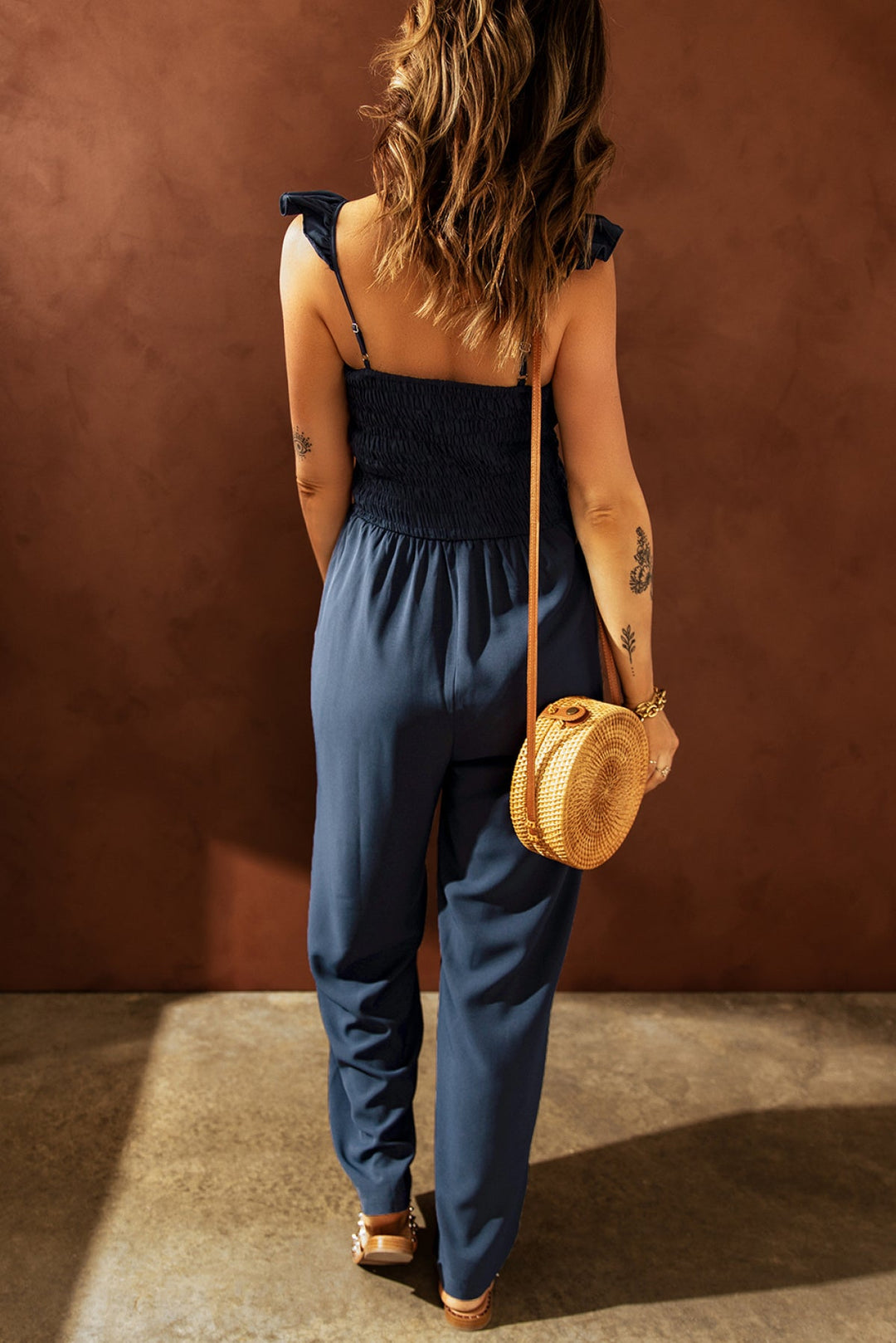 Flutter Sleeve Smocked Wide Leg Jumpsuit